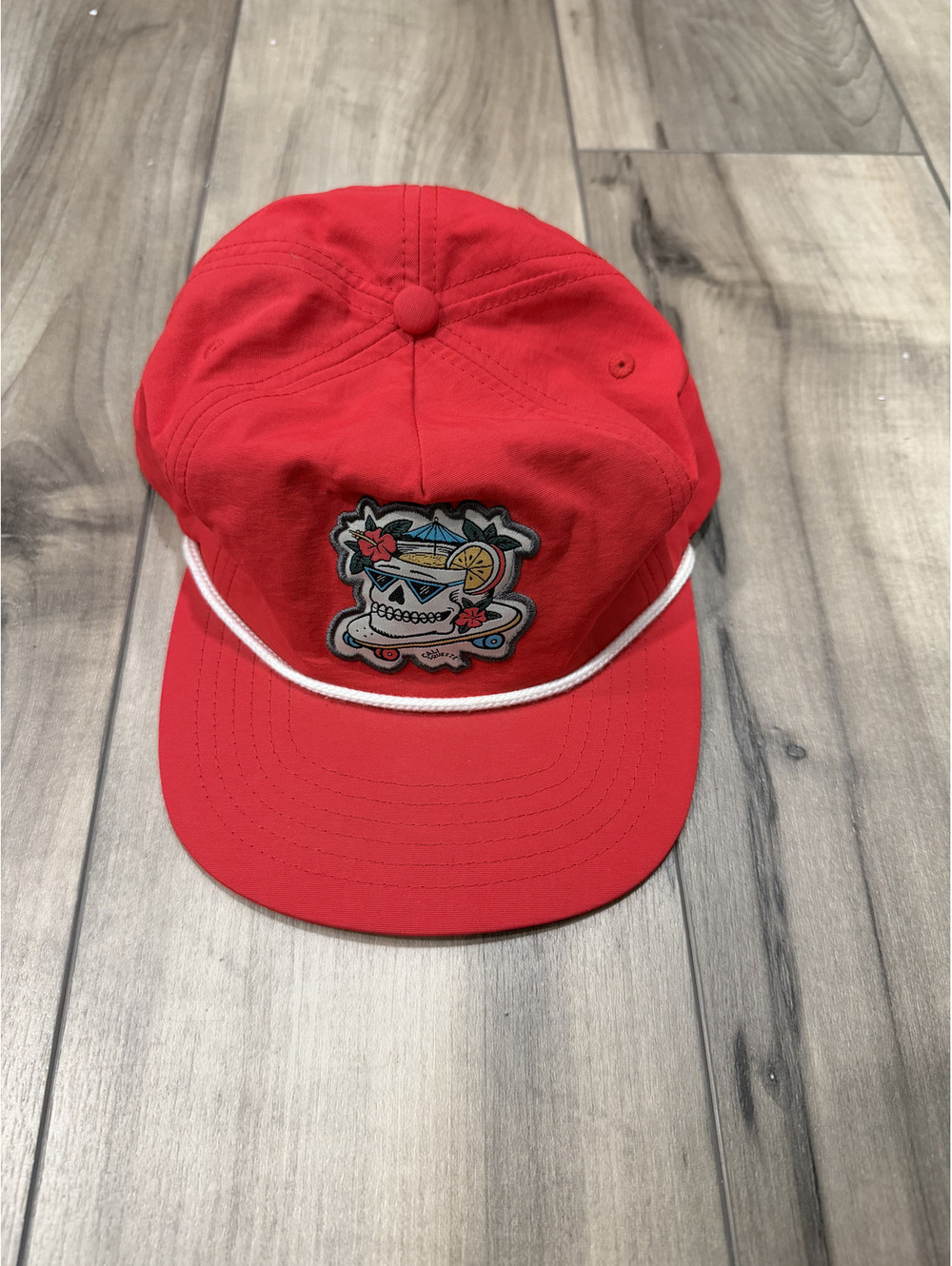 Cali Squeeze Red Rope Snapback Hat with Skull Figure